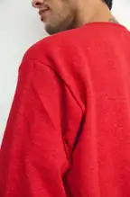 Ver foto 1: Buzo de frisa cuello redondo rojo, detalle de la tela